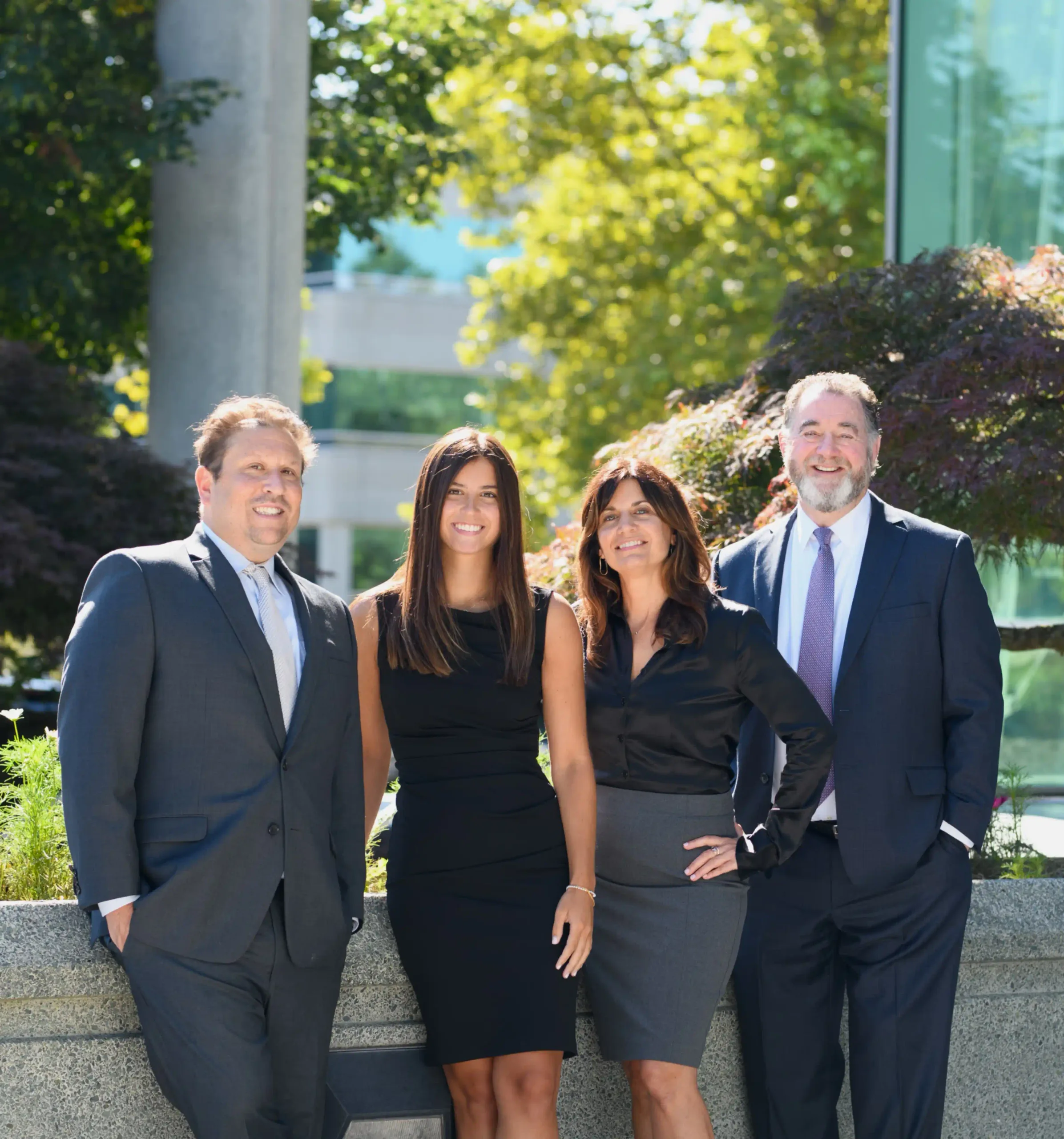 Eleiva Financial team of four standing together outdoors